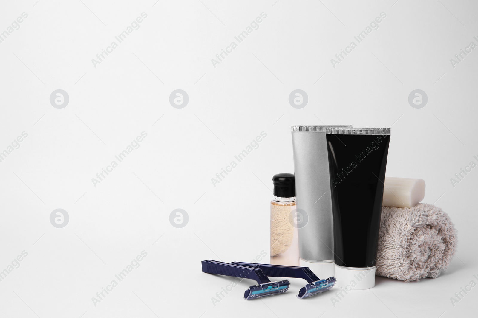 Photo of Different men's shaving accessories on light background, space for text