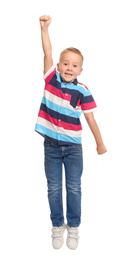 Photo of Cute little boy jumping on white background