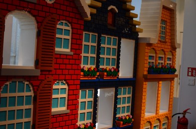 Photo of AMSTERDAM, NETHERLANDS - AUGUST 06, 2022: Buildings made with colorful Lego constructor indoors