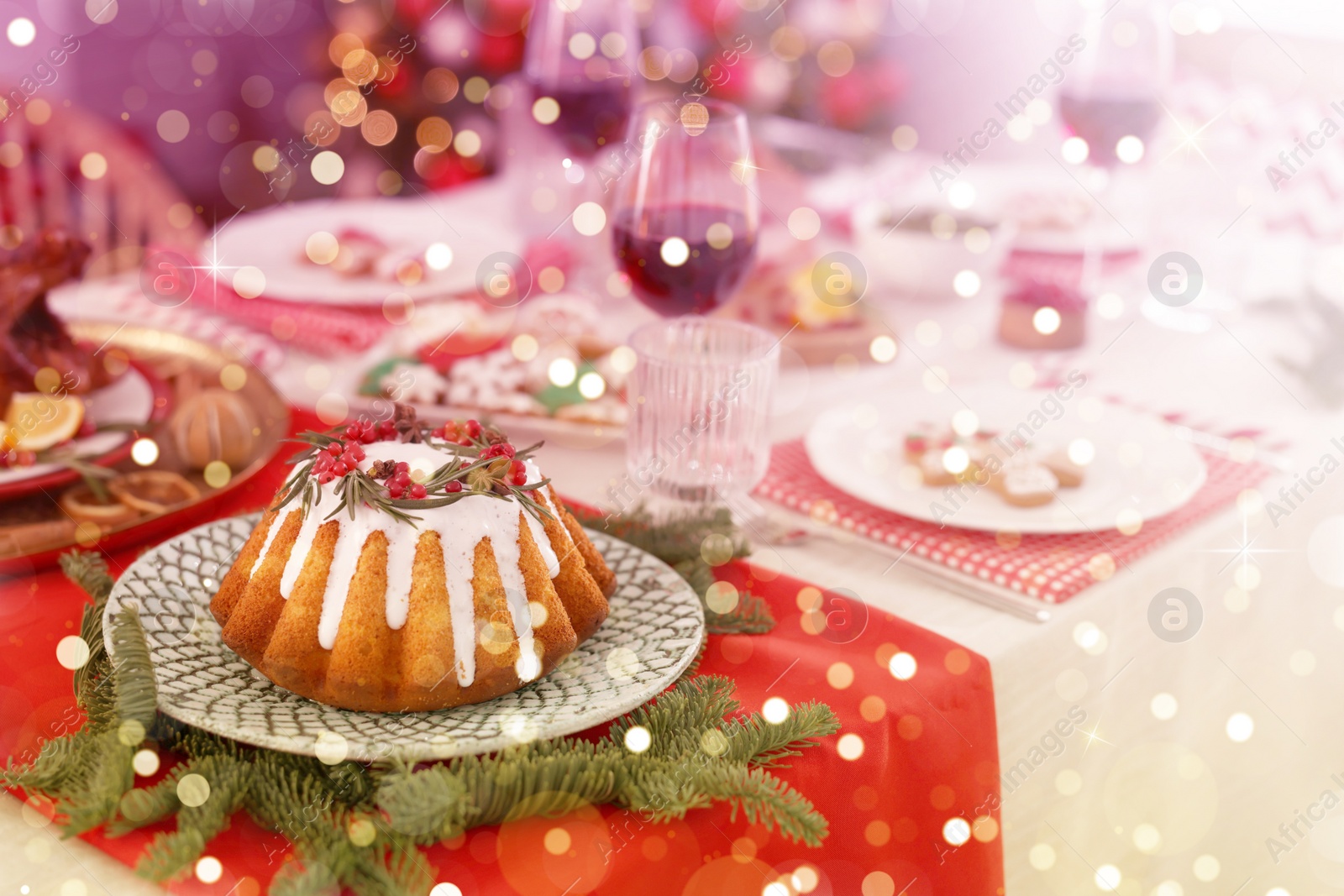 Image of Festive dinner with delicious cake served on table indoors. Christmas Eve celebration