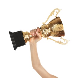 Young woman holding gold trophy cup on white background, closeup