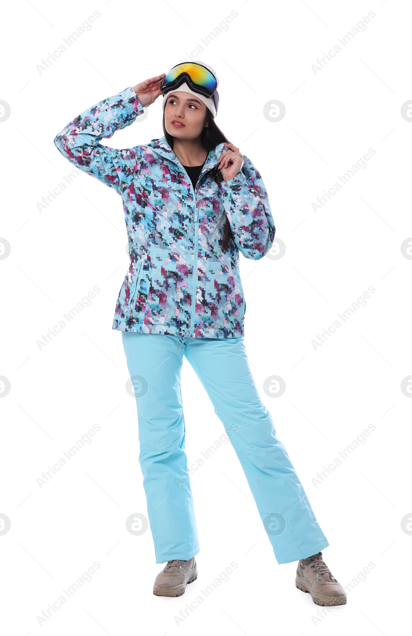 Photo of Woman wearing stylish winter sport clothes on white background