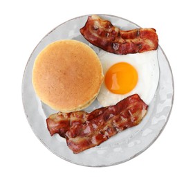 Plate with tasty pancakes, fried egg and bacon isolated on white, top view