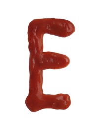 Photo of Letter E written with ketchup on white background