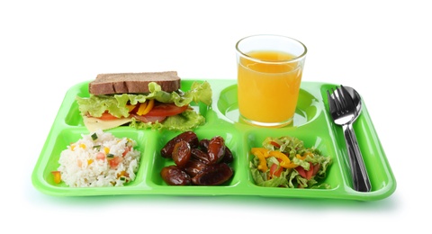 Photo of Serving tray with healthy food on white background. School lunch
