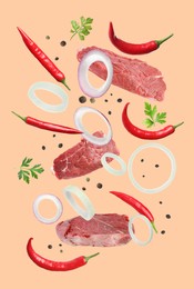 Image of Beef meat and different spices falling on beige background