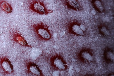 Texture of frozen ripe strawberry, macro view