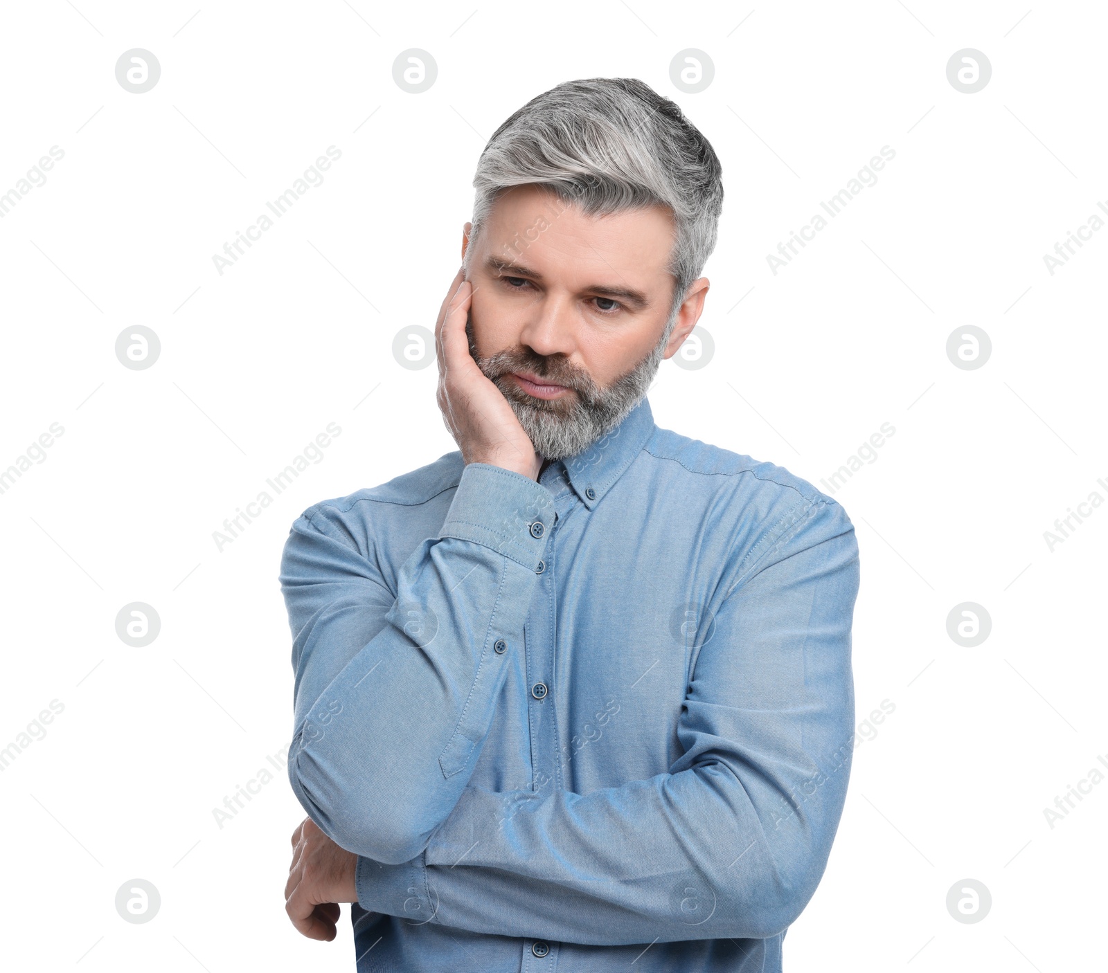 Photo of Mature businessman in stylish clothes posing on white background