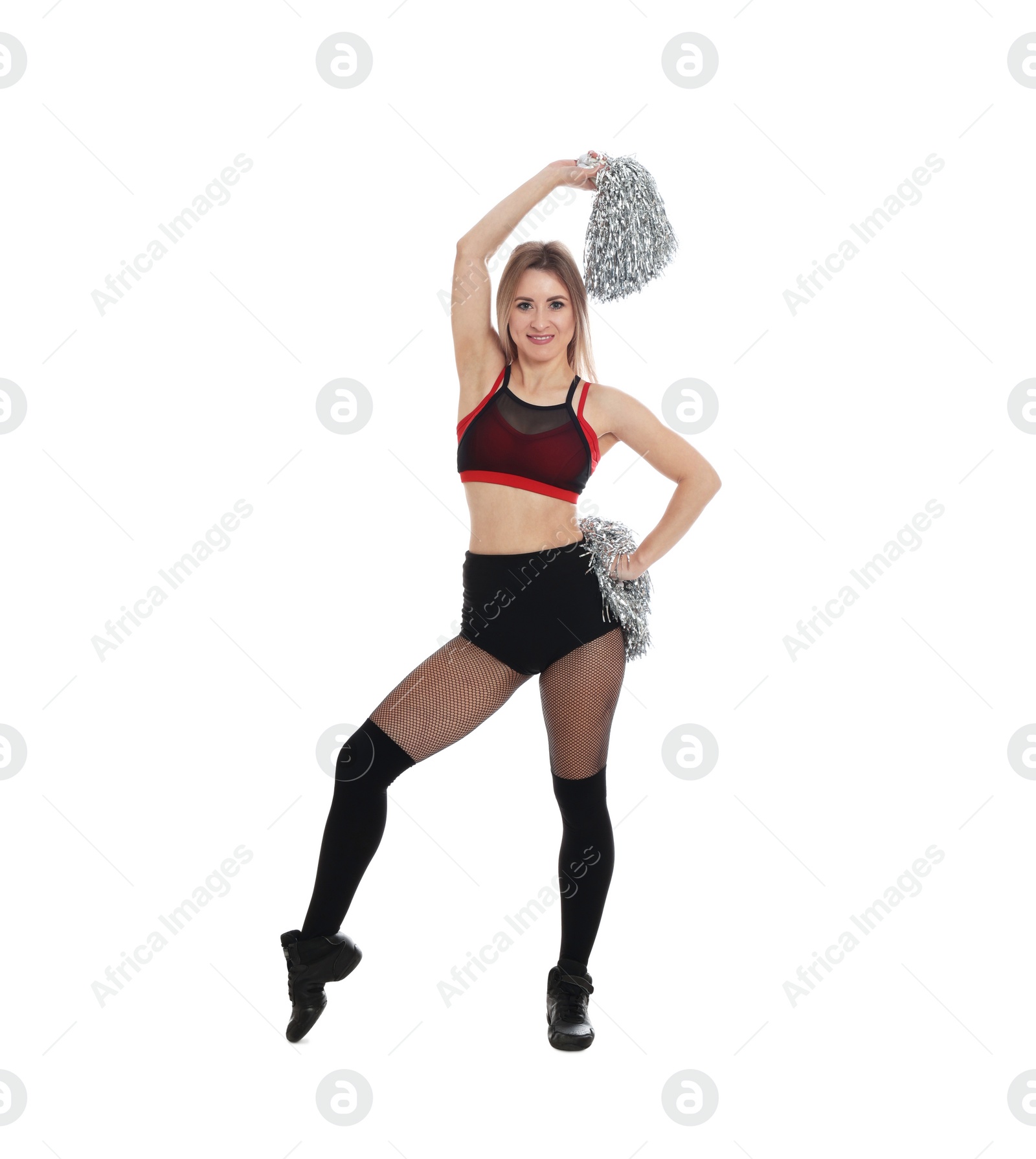 Photo of Beautiful cheerleader in costume holding pom poms on white background