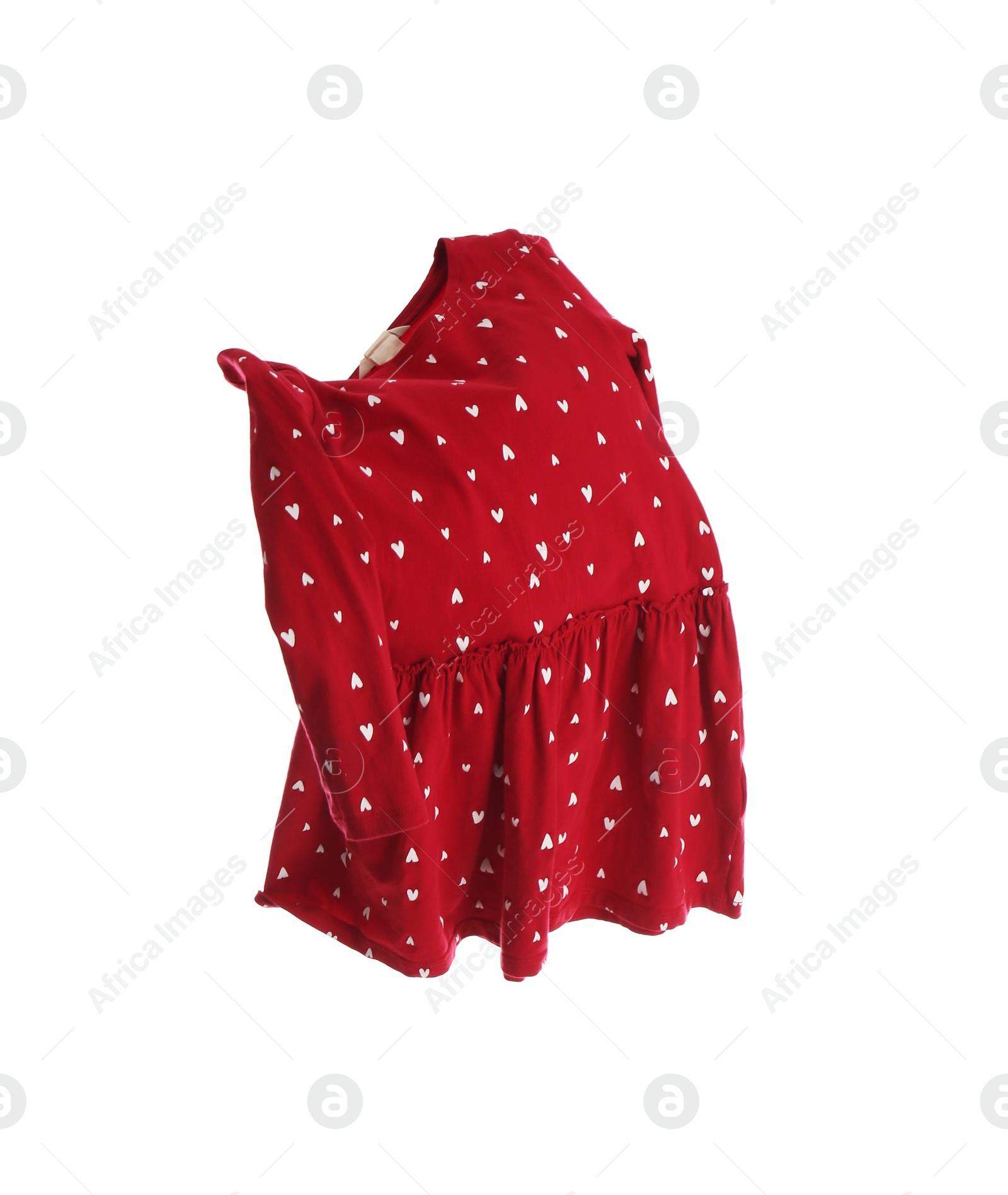 Photo of Red dress with heart pattern isolated on white