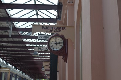 Utrecht, Netherlands - July 23, 2022: Spoorwegmuseum. Vintage clock on wall at railway station