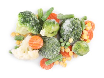 Photo of Mix of different frozen vegetables isolated on white, top view