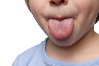 Photo of Little boy showing his tongue on white background, closeup
