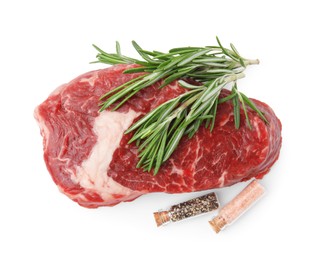 Piece of fresh beef meat with rosemary and spices isolated on white, top view