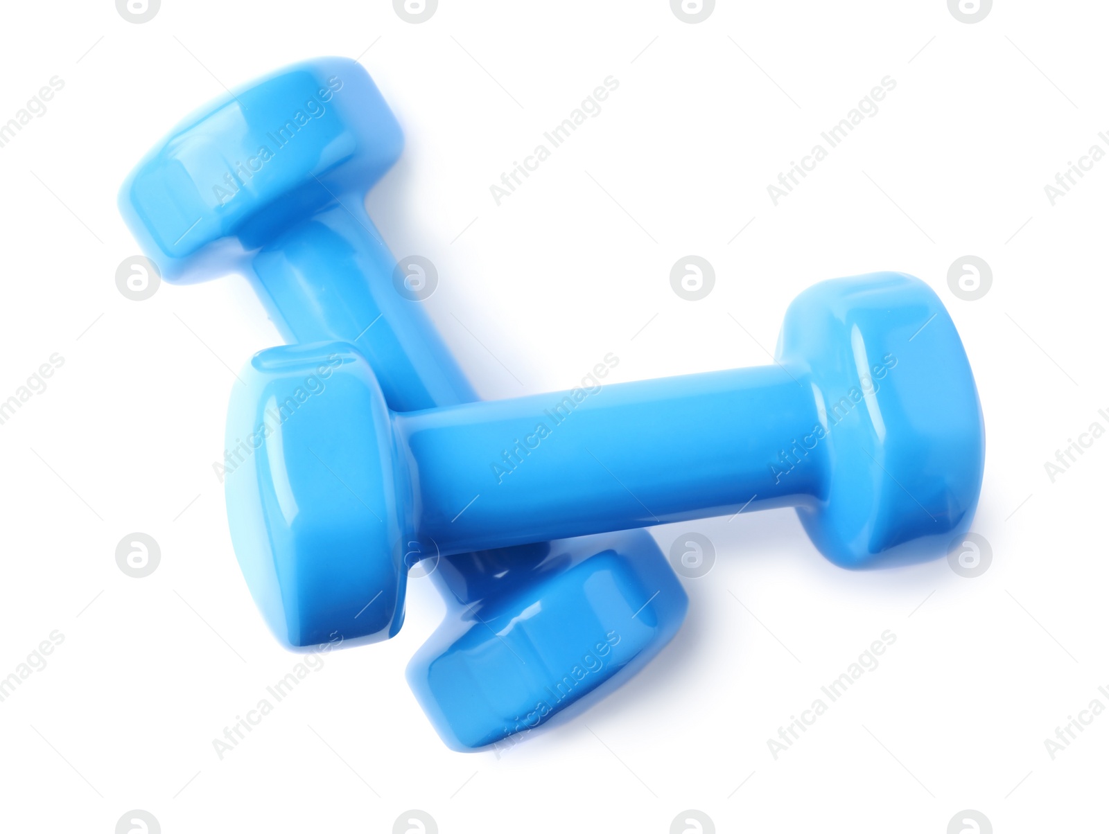 Photo of Color dumbbells on white background. Home fitness