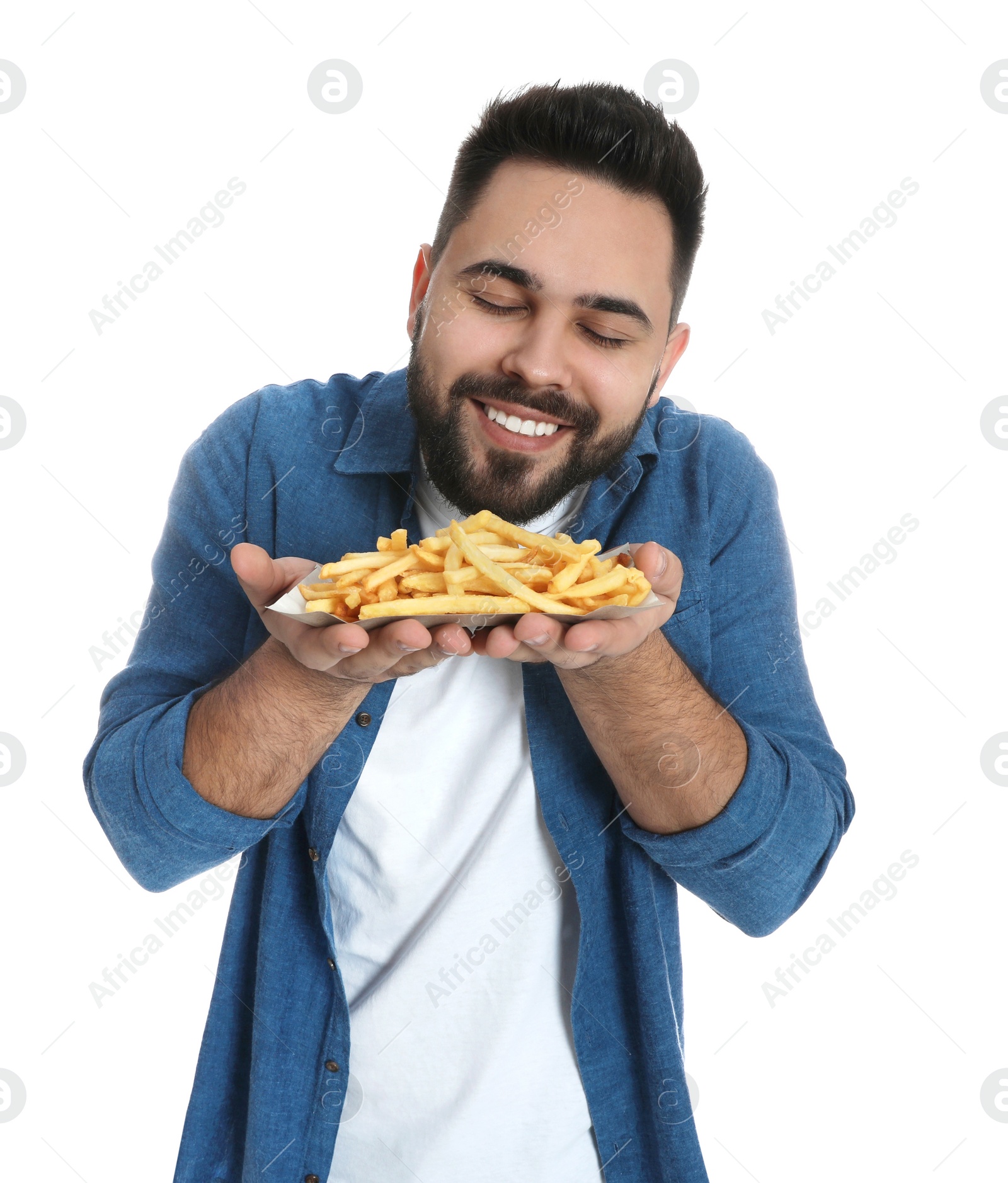 Photo of Young man with French fries on white background