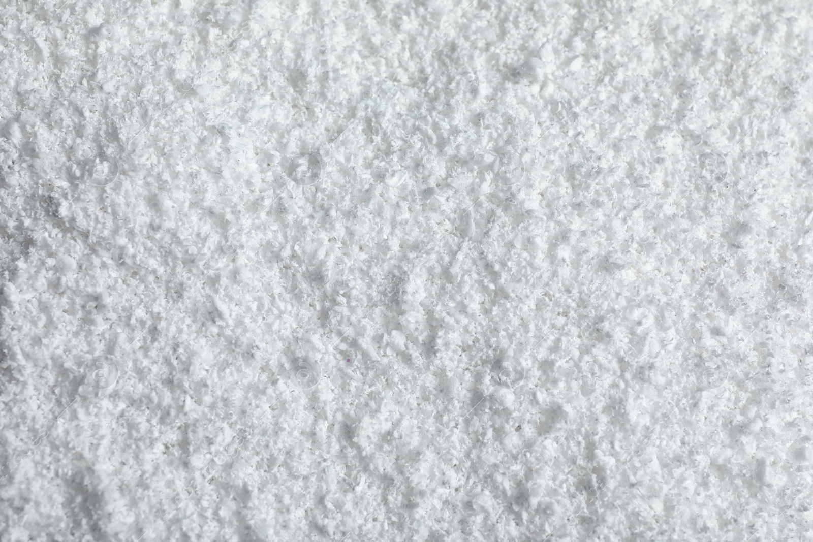 Photo of Pile of white snow as background, top view