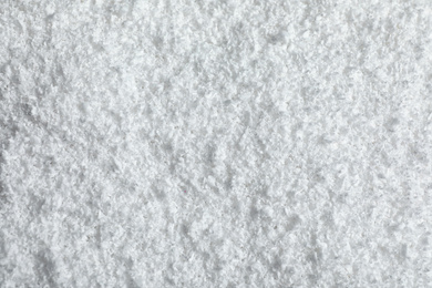Photo of Pile of white snow as background, top view