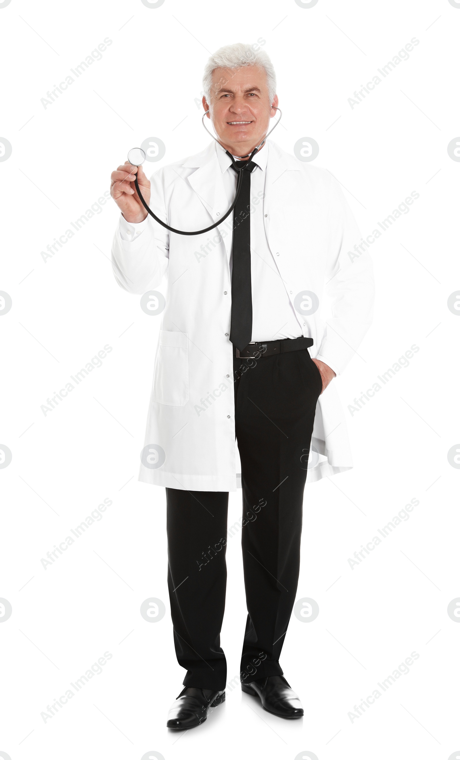 Photo of Full length portrait of male doctor with stethoscope isolated on white. Medical staff