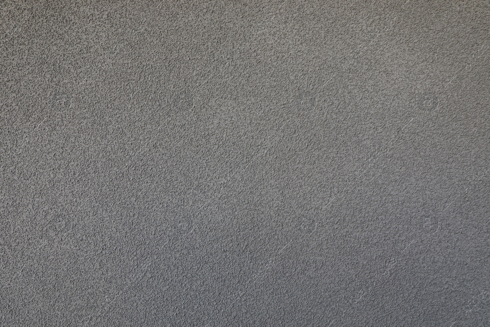 Photo of Texture of grey plaster wall as background