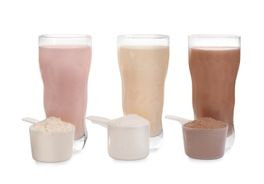 Photo of Protein shakes and different types of powder isolated on white