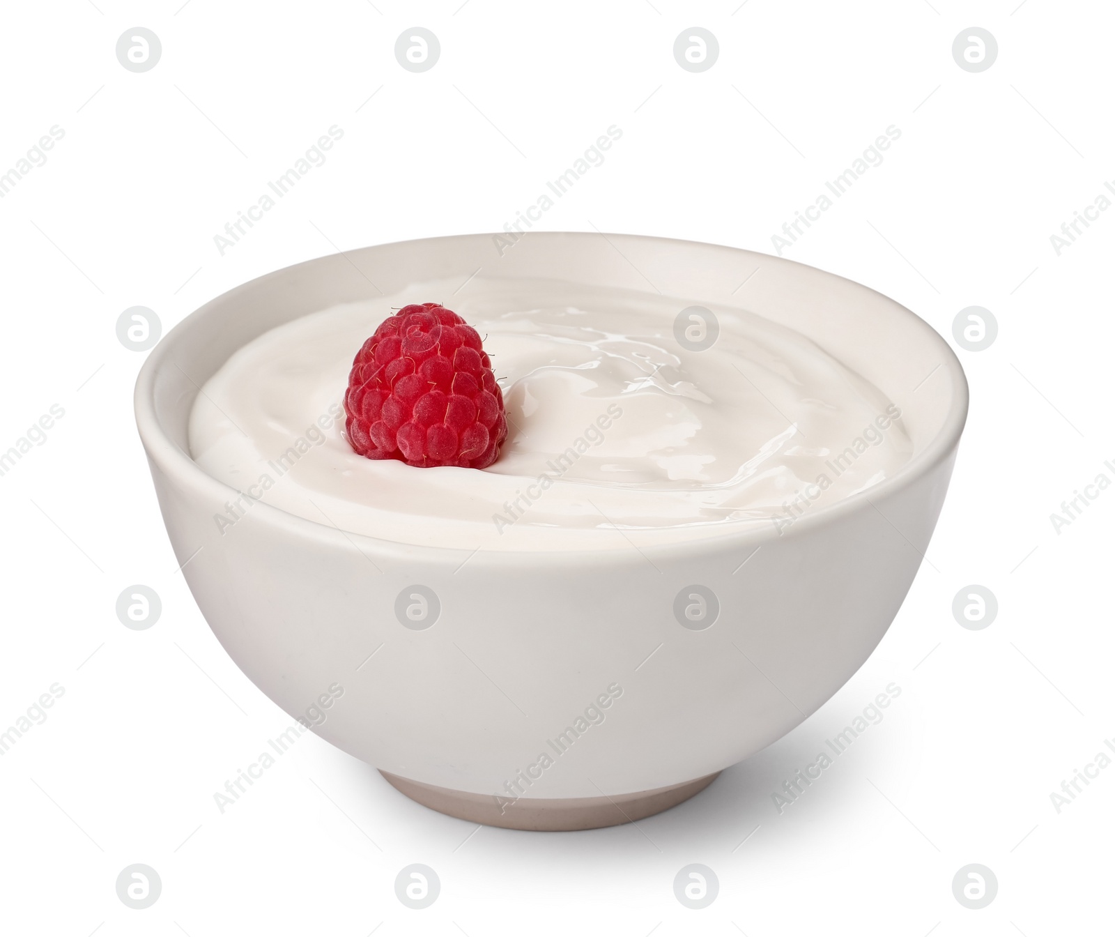 Photo of Bowl of delicious yogurt with raspberry isolated on white