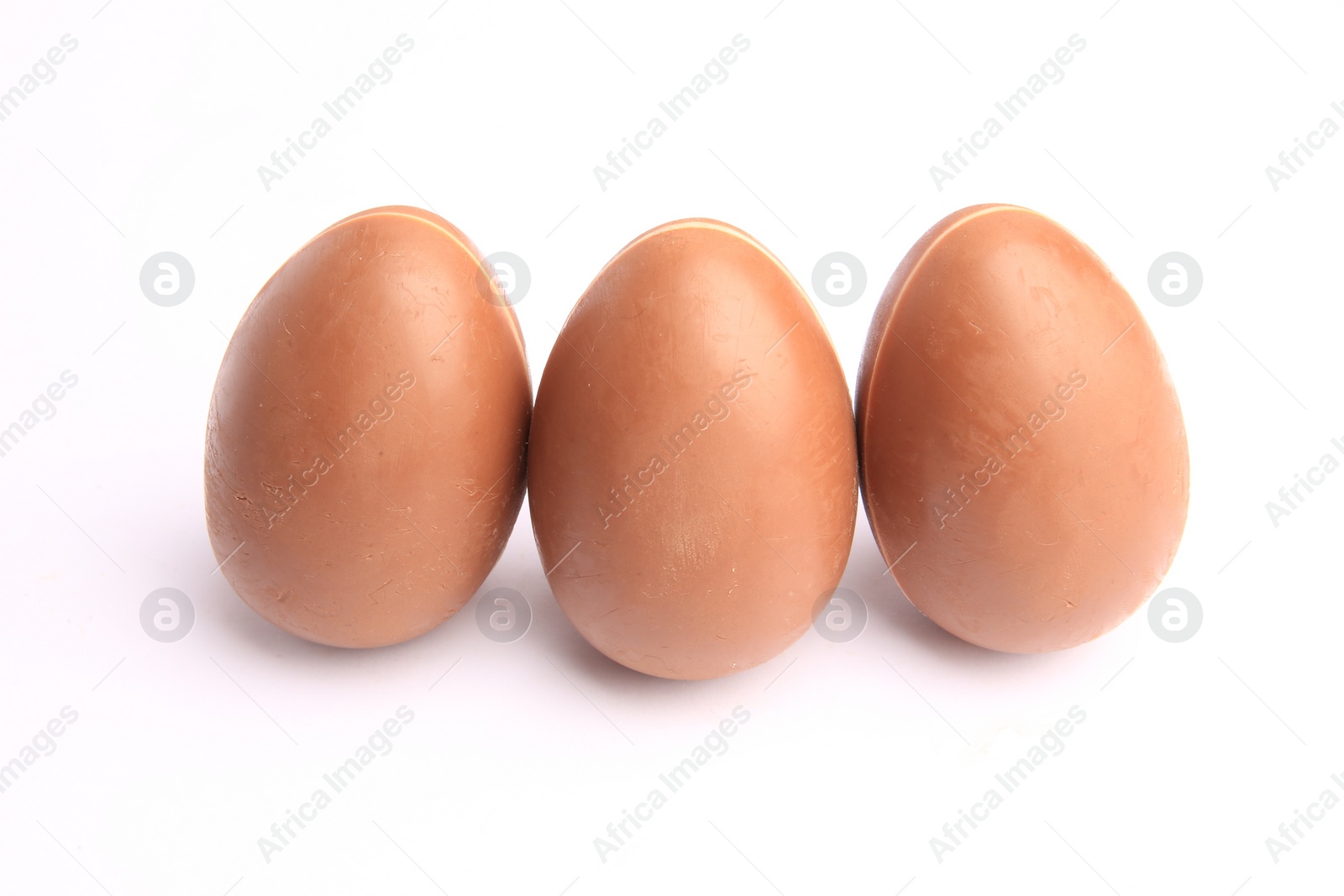 Photo of Sveti Vlas, Bulgaria - June 27, 2023: Unwrapped Kinder Surprise Eggs isolated on white