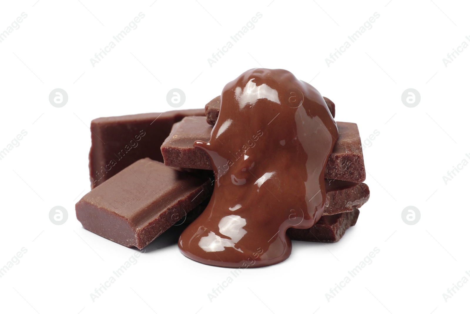 Photo of Pieces of milk chocolate with tasty paste isolated on white