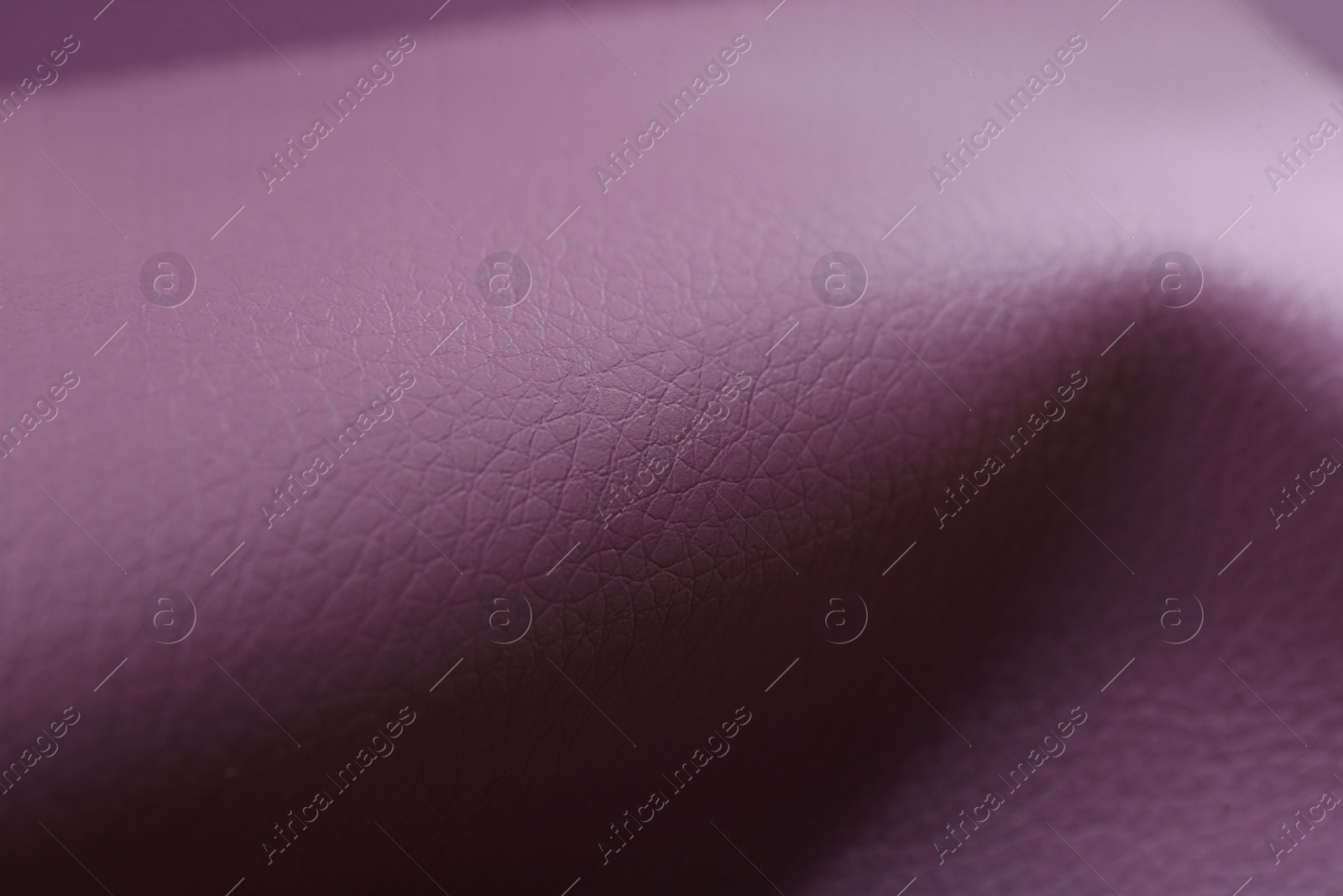 Photo of Beautiful purple leather as background, closeup view