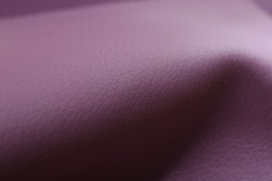 Photo of Beautiful purple leather as background, closeup view