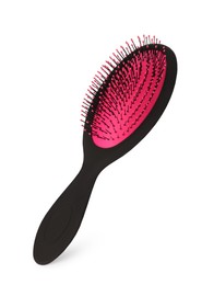 One new plastic hairbrush isolated on white