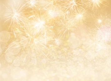 Abstract festive background with fireworks, bokeh effect. New Year celebration