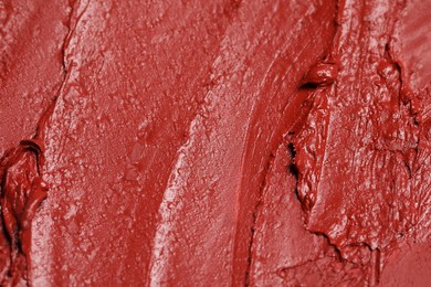 Photo of Texture of beautiful lipstick as background, closeup