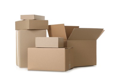 Photo of Pile of cardboard boxes on white background