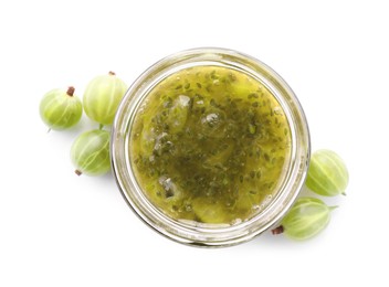Jar of delicious gooseberry jam and fresh berries on white background, top view
