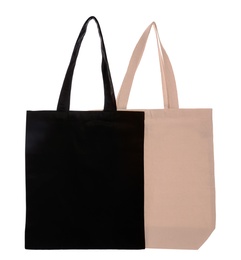 Photo of Eco bags on white background. Mock up for design