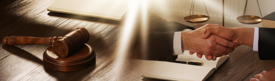 Law and justice. Double exposure of people shaking hands at wooden table and wooden gavel. Banner design