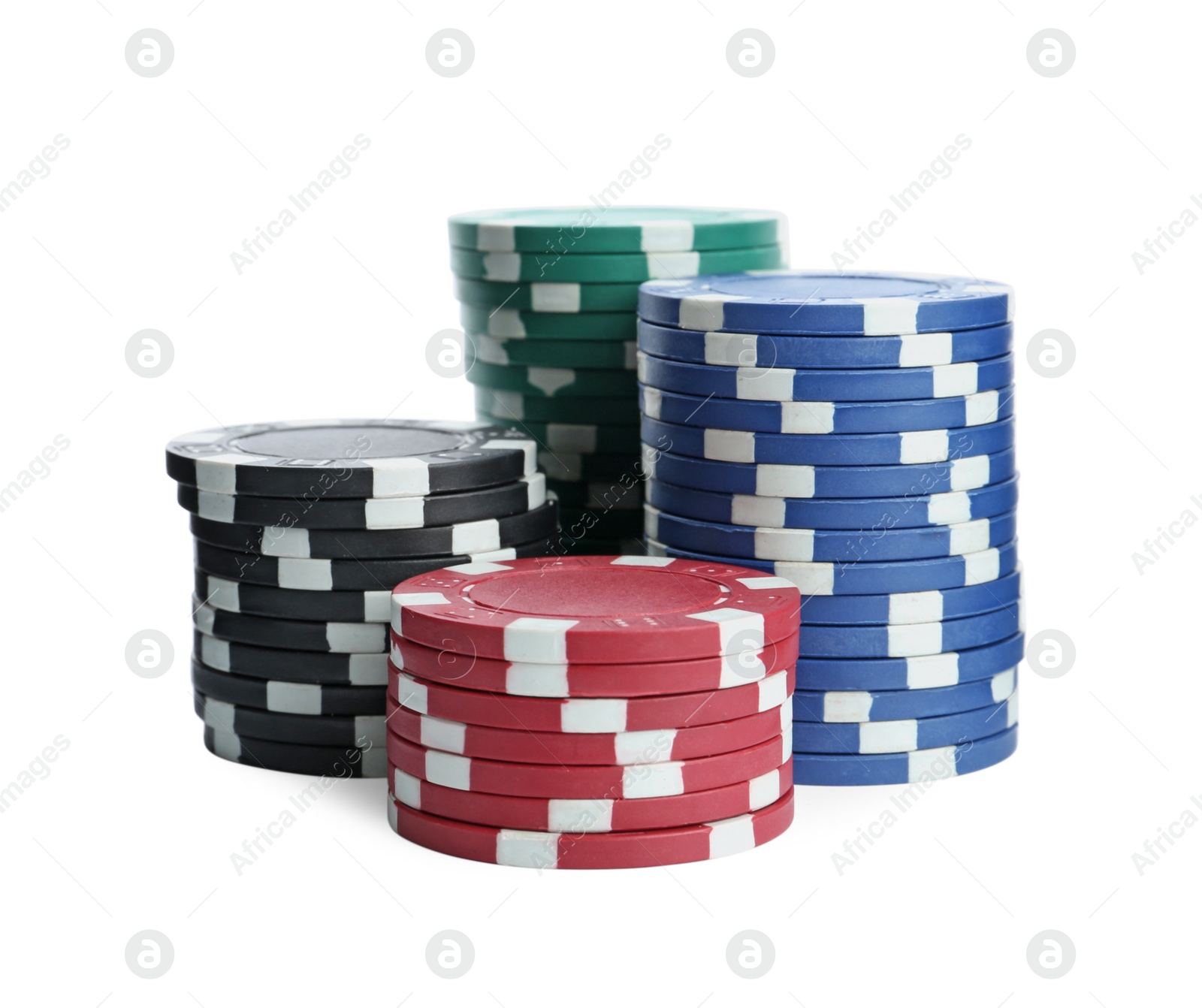 Photo of Plastic casino chips stacked on white background. Poker game