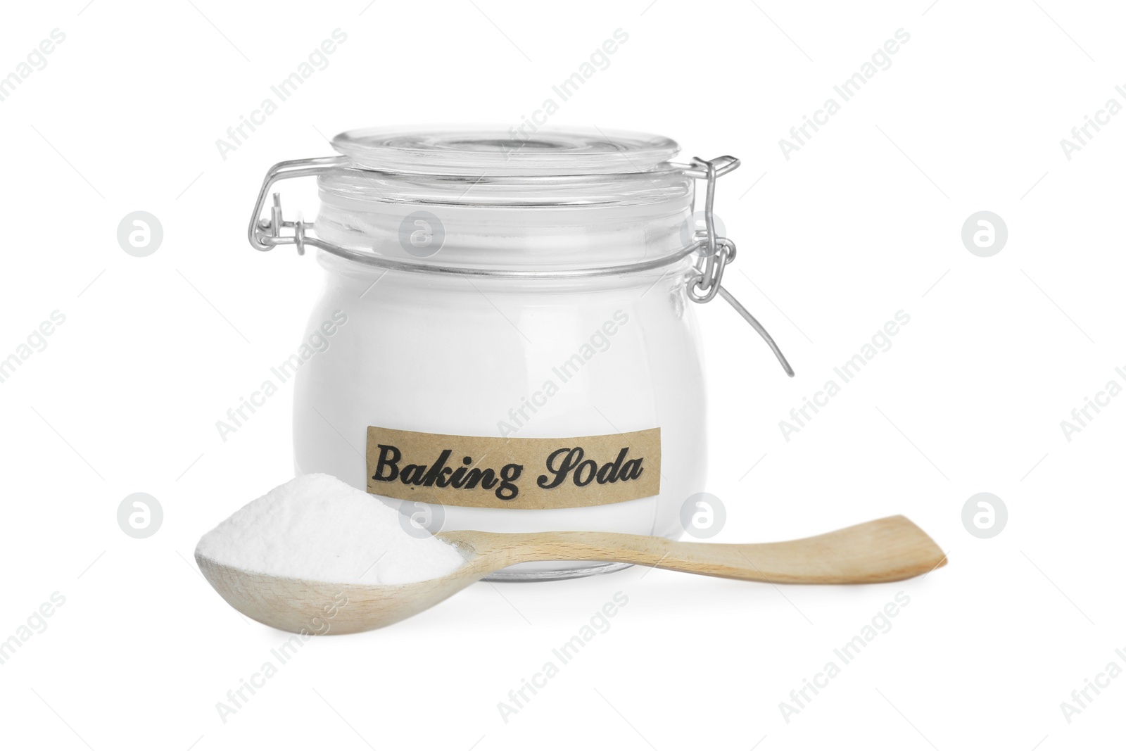 Photo of Spoon and jar with baking soda on white background