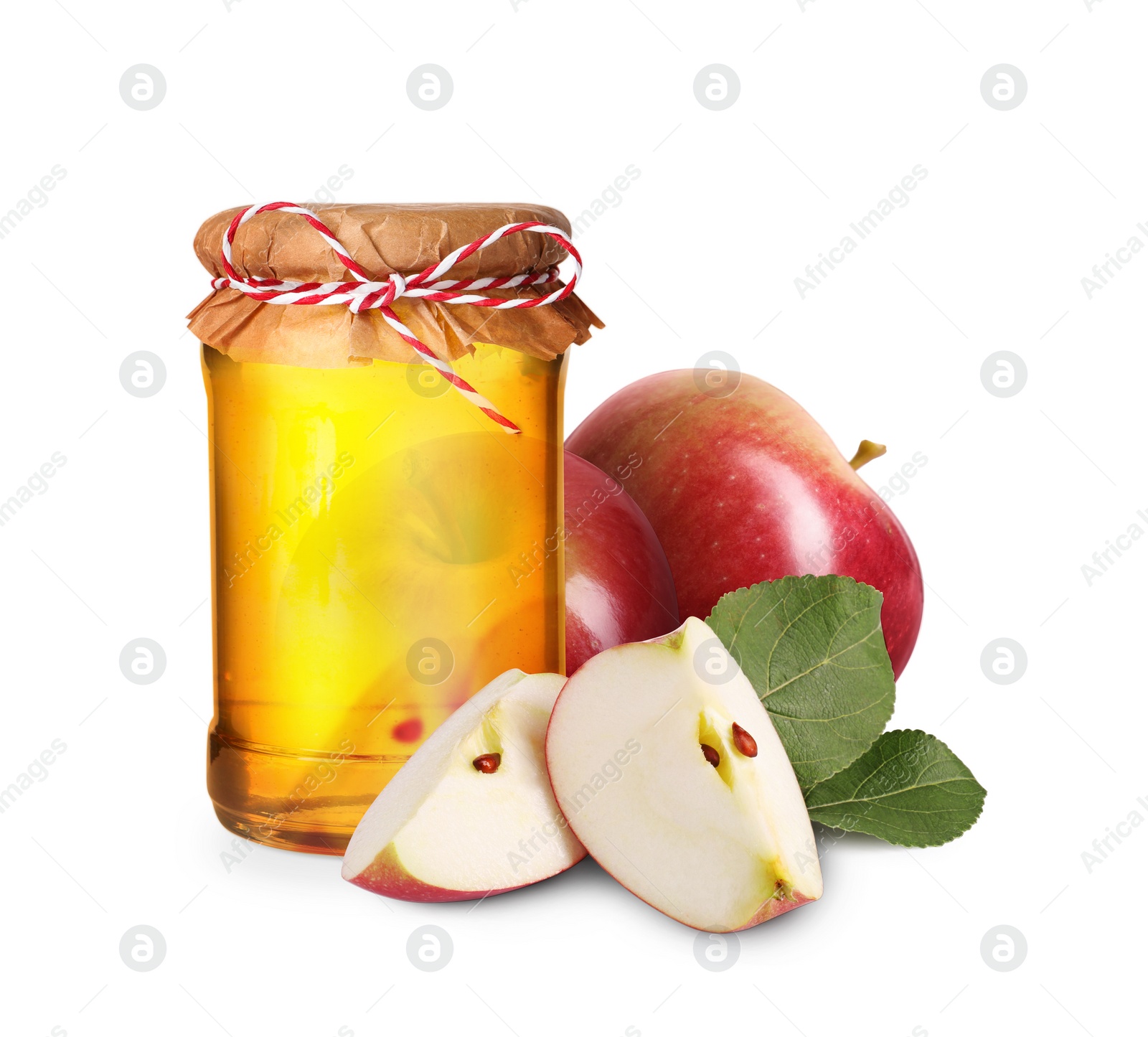 Image of Honey in glass jar and apples isolated on white