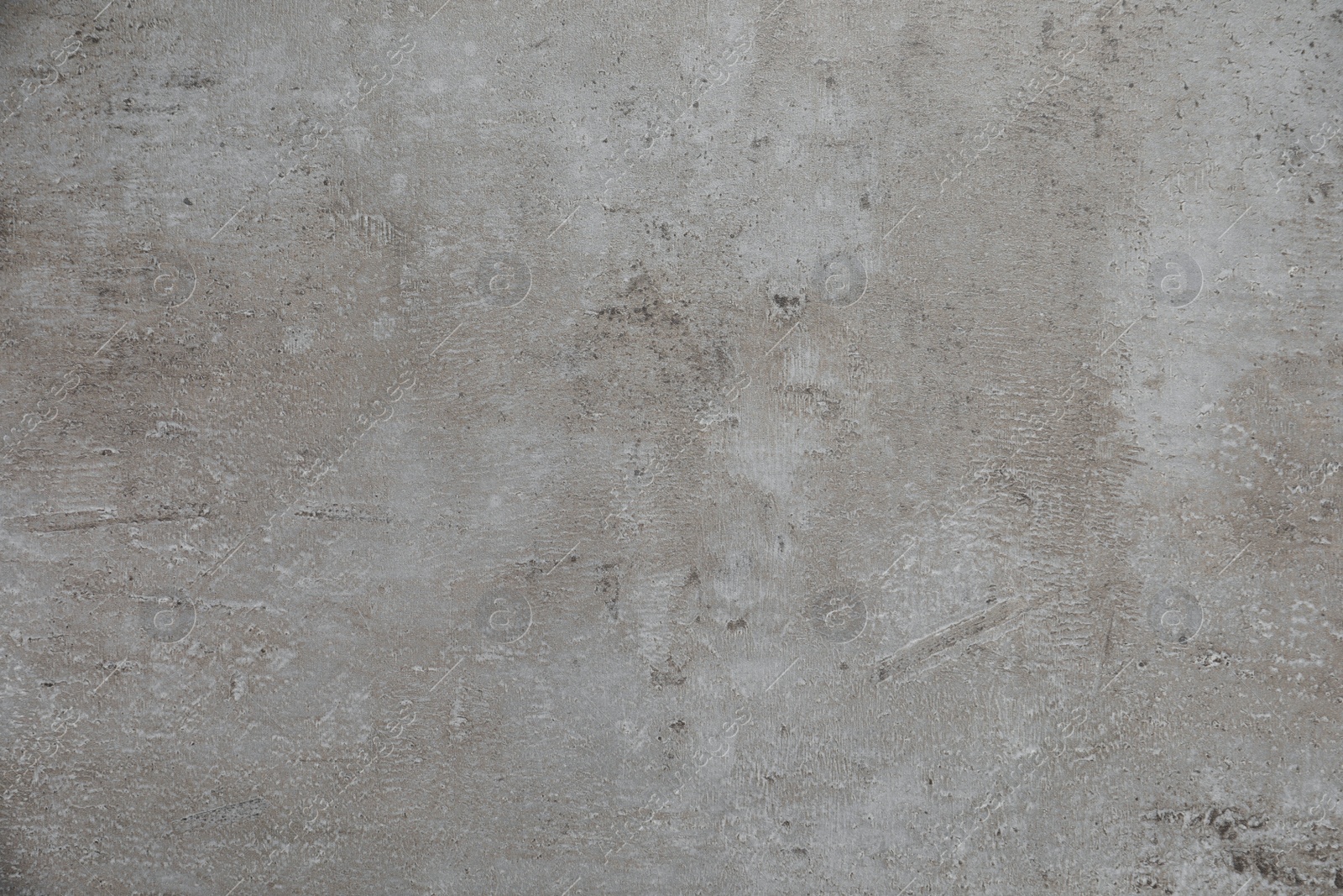 Photo of Texture of light grey stone surface as background, closeup