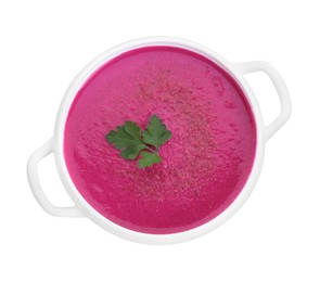 Photo of Delicious beetroot cream soup in bowl isolated on white, top view