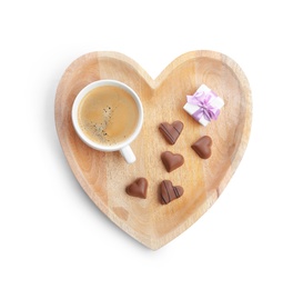Romantic breakfast with cup of coffee, chocolate candies and gift box isolated on white, top view. Valentine's day celebration