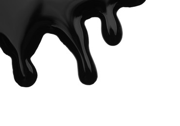 Black viscous liquid flowing on white background