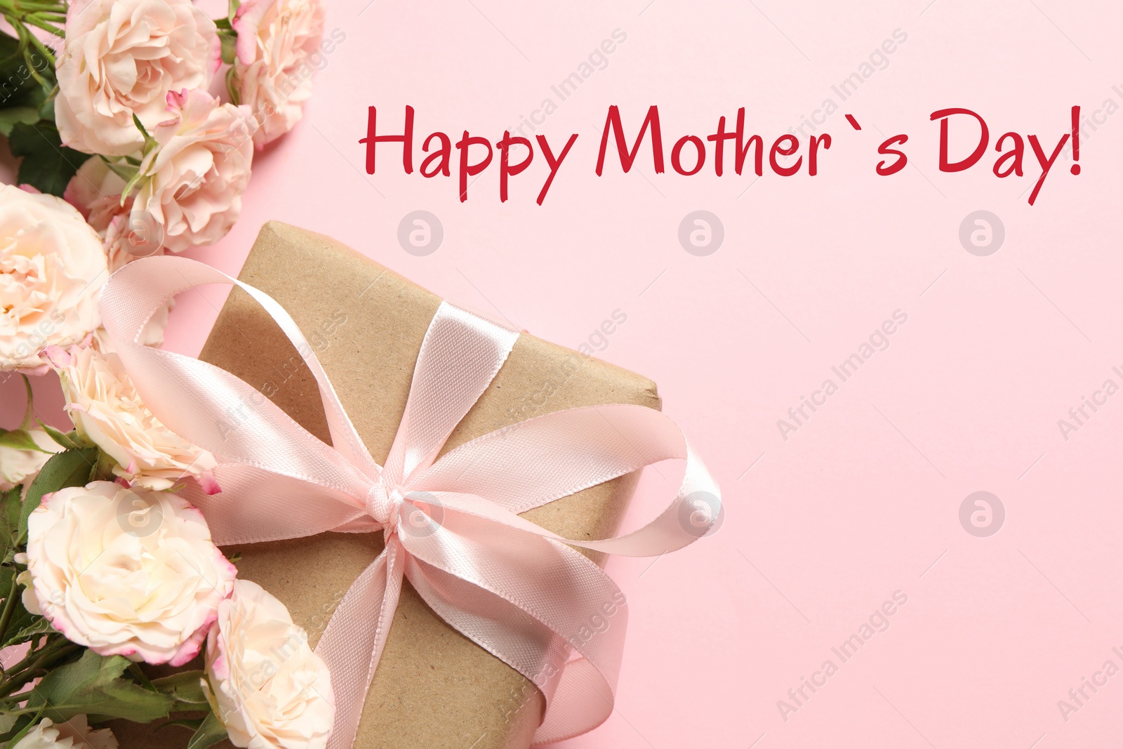 Image of Happy Mother's Day greeting card. Beautiful flowers and gift box on pink background