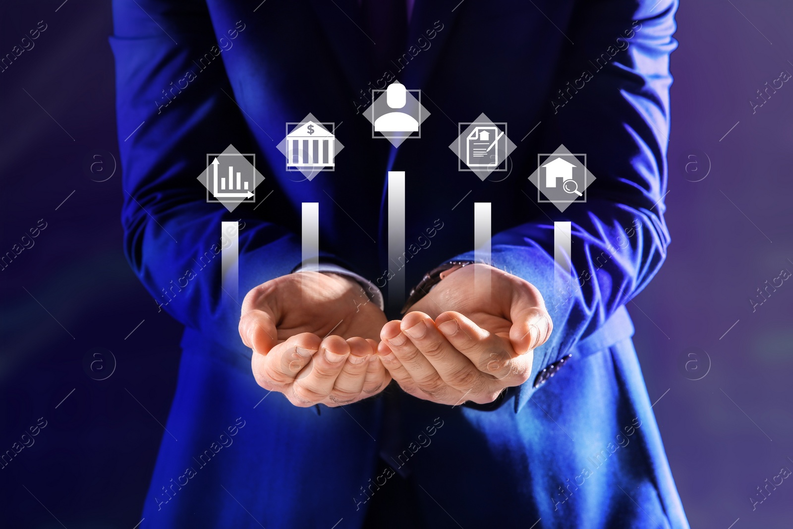 Image of Real estate agent demonstrating icons on dark background, closeup