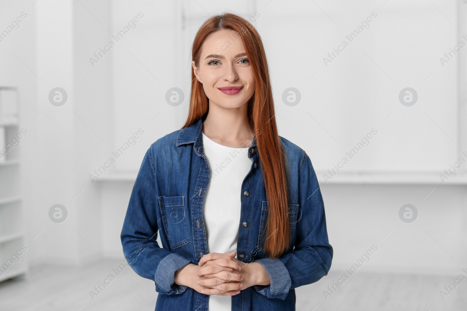 Photo of Portrait of beautiful young woman at home
