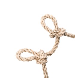 Hemp rope with knots isolated on white, top view