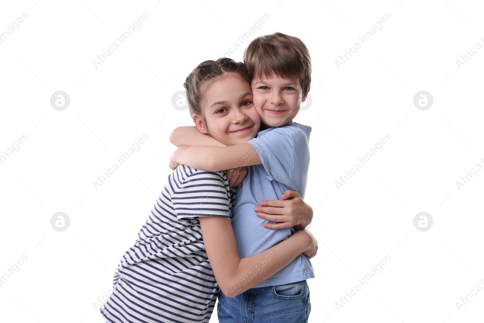 Photo of Happy brother and sister hugging on white background