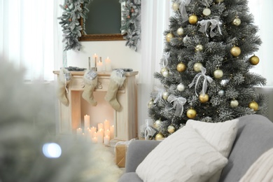 Decorated Christmas tree in modern living room interior